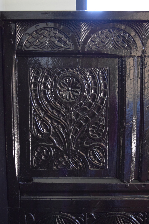 Village Hall Carved Bench in Fireplace