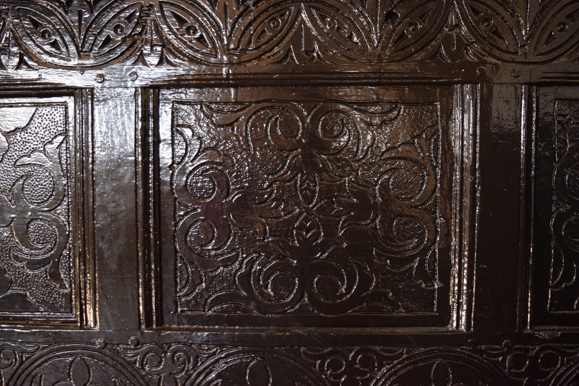 Village Hall Carved Bench in Fireplace